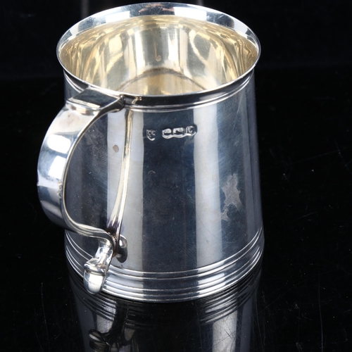 324 - An Edwardian silver christening mug, in Charles II style, by Tessiers Ltd, hallmarks Sheffield 1920,... 