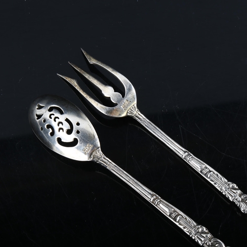 336 - GORHAM - an American sterling silver matching sifter spoon and bread fork, cast cherub decoration, l... 