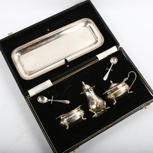 344 - A cased Elizabeth II silver cruet set, comprising tray, pepperette, mustard pot and salt cellar, wit... 