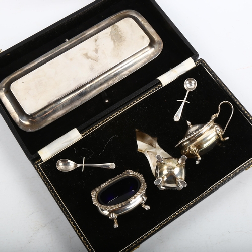 344 - A cased Elizabeth II silver cruet set, comprising tray, pepperette, mustard pot and salt cellar, wit... 