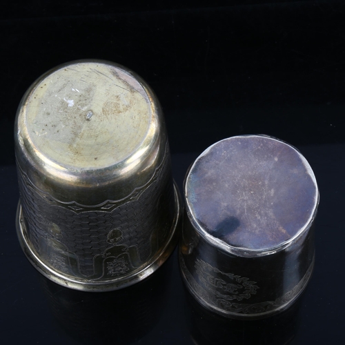 348 - A Continental silver-gilt beaker, and a small unmarked white metal mug, largest height 8cm (2)