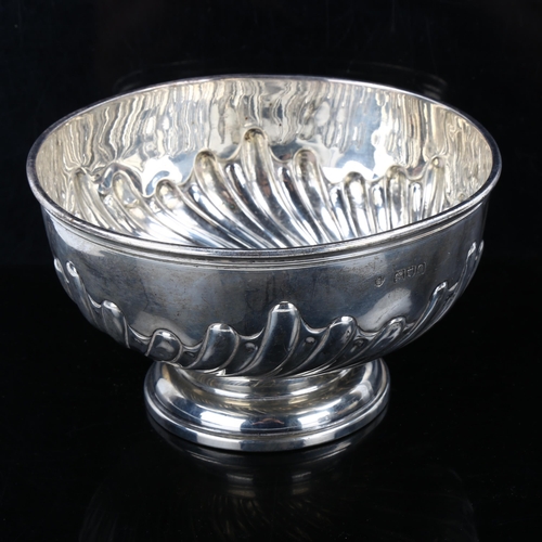 351 - A late Victorian silver pedestal rose bowl, relief embossed half-fluted decoration, by Edward Barnar... 