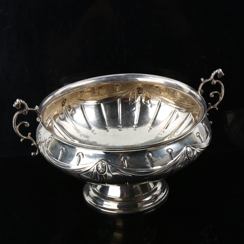 352 - A Victorian silver 2-handled pedestal trophy bowl, with relief embossed Adams style swag decoration,... 