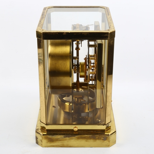 1 - JAEGER LECOULTRE - a lacquered brass Atmos clock, square white dial with Arabic numerals and glass p... 