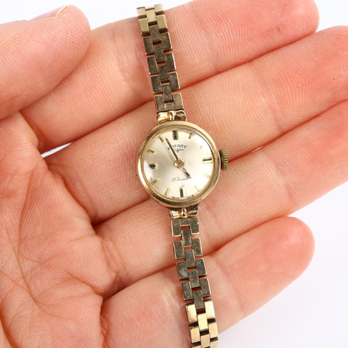 13 - ROTARY - a lady's Vintage 9ct gold mechanical wristwatch, silvered dial with baton hour markers and ... 