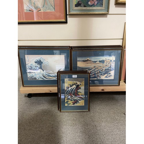 2185 - A group of Japanese re-prints, framed (11)