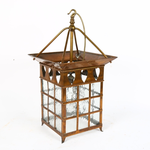 47 - An Arts and Crafts style copper ceiling lantern, with heart motif, width 29cm, height 53cm