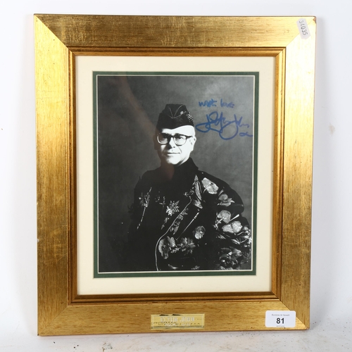 81 - An Elton John autographed Rocket Man photograph, framed, overall 39cm x 34cm, with certificate of au... 