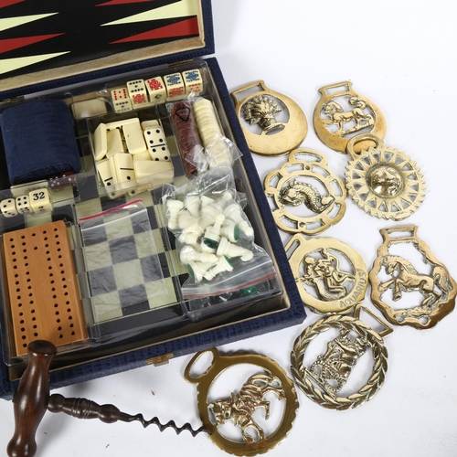 96 - Travelling games box, Antique steel corkscrew, horse brasses etc