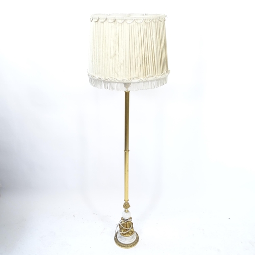 2067 - A French Empire style brass standard lamp and shade, with dolphin decoration to base, height overall... 