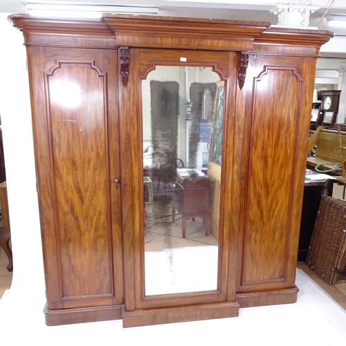 2072 - An Antique mahogany 3-door armoire, with single mirrored door, W220cm, H211cm, D85cm