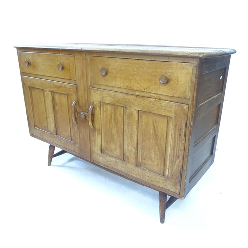 2077 - A mid-century Ercol elm sideboard, with 2 drawers and 2 panelled doors, W124cm, H82cm, D46cm