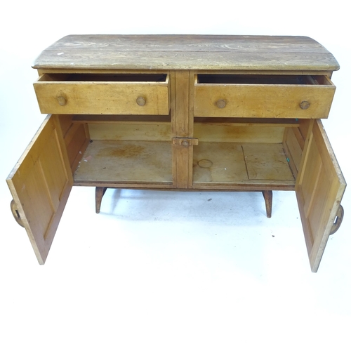 2077 - A mid-century Ercol elm sideboard, with 2 drawers and 2 panelled doors, W124cm, H82cm, D46cm