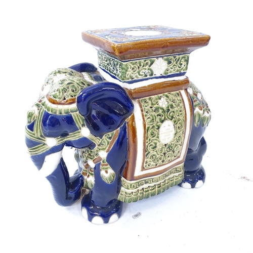 2079 - A glazed ceramic elephant garden seat, L50cm, H44cm