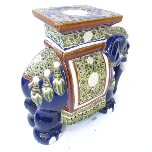 2079 - A glazed ceramic elephant garden seat, L50cm, H44cm