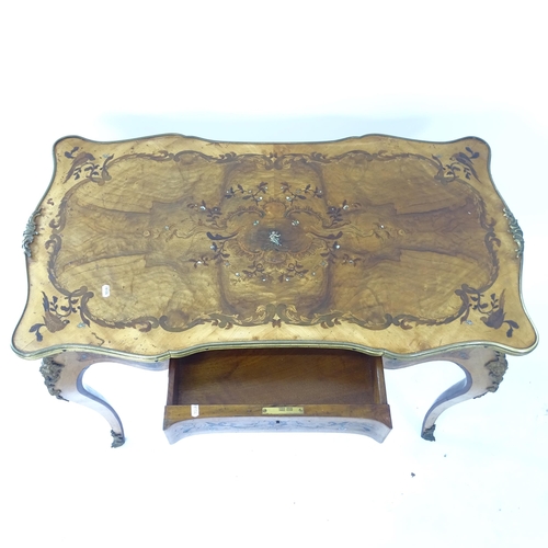 2083 - A French ormolu mounted centre table with shaped top and frieze having extensive mother of pearl, wa... 