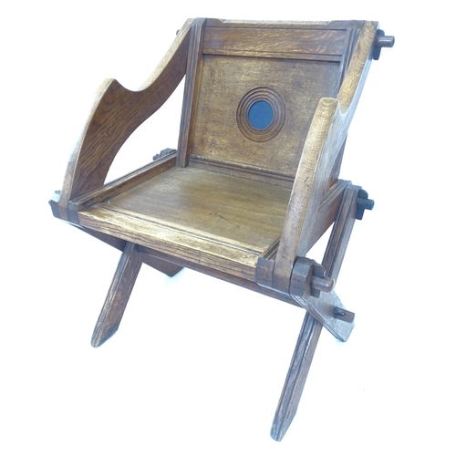 2092 - An Antique oak Glastonbury chair, overall W75cm, H84cm, D57cm, seat W47cm, H45cm, D39cm