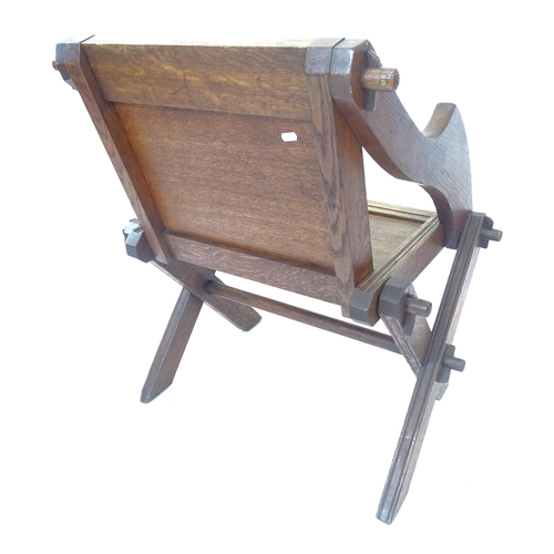 2092 - An Antique oak Glastonbury chair, overall W75cm, H84cm, D57cm, seat W47cm, H45cm, D39cm