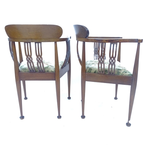 2096 - A pair of Edwardian Arts and Crafts Glasgow School style tub armchairs