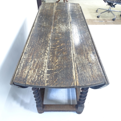 2097 - A 19th century oak gateleg dining table, L138cm, H69cm, D57cm