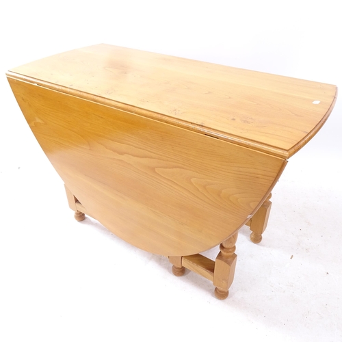 2104 - WITHDRAWN - A modern pine bow-end gateleg dining table, L113cm, H77cm, D55cm