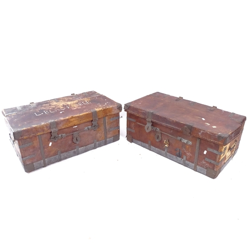 2105 - A pair of metal-bound leather-covered chests, W75cm, H32cm, D40cm