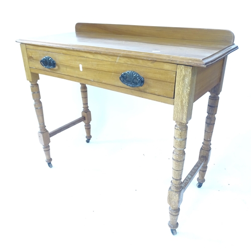 2129 - A modern pine dressing table, with single frieze drawers on turned legs, W93cm, H78cm, D39cm