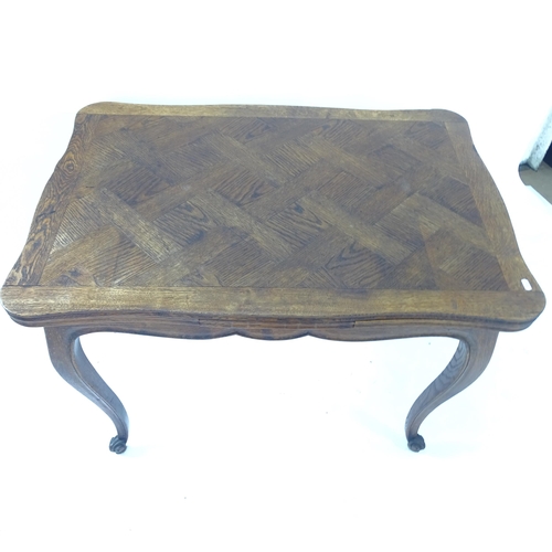 2137 - A parquetry-topped French draw leaf dining table, L110cm extending to 170cm, H75cm, D69cm