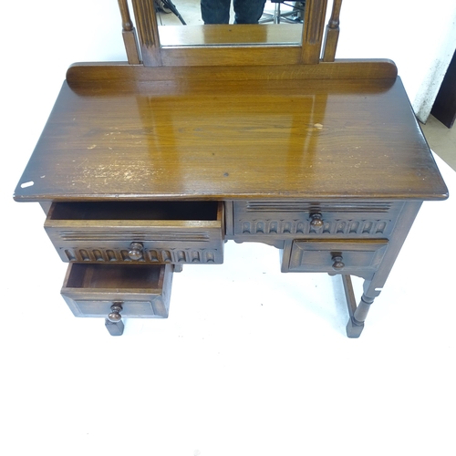 2139 - A mid-century Ipswich oak design dressing table, with mirror-back and 4 drawers, W94cm, H148cm, D47c... 