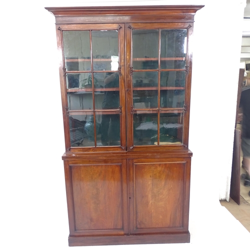 2140 - A Victorian mahogany 2-section library bookcase, W126cm, H214cm, D40cm