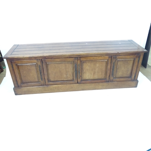 2141 - A modern plank-top sideboard, with 4 panelled doors, L211cm, H68cm, D56cm