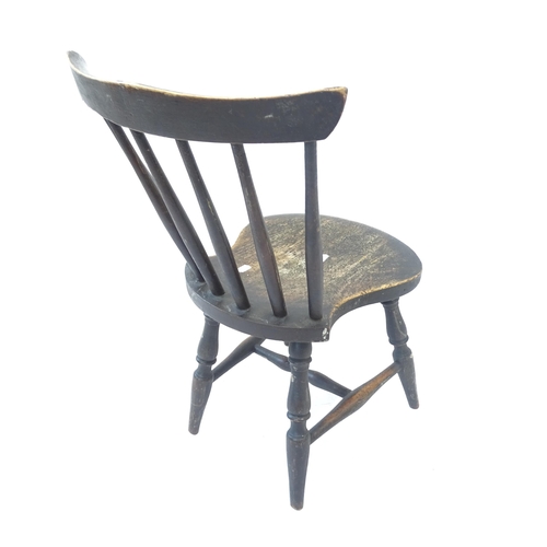 2152 - An Antique elm-seated child's stick-back chair