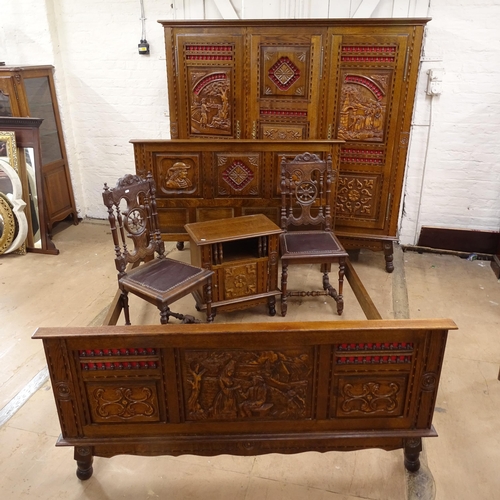 2171 - A Breton French oak bedroom suite, comprising a 3-door armoire, a 4' 6