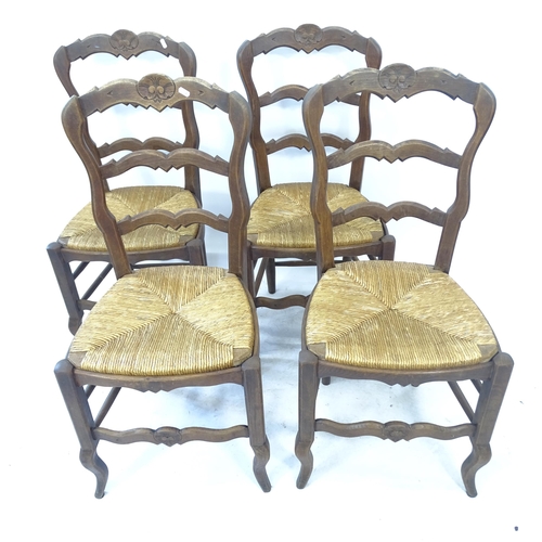 2172 - A set of 4 French oak rush-seated ladder-back dining chairs