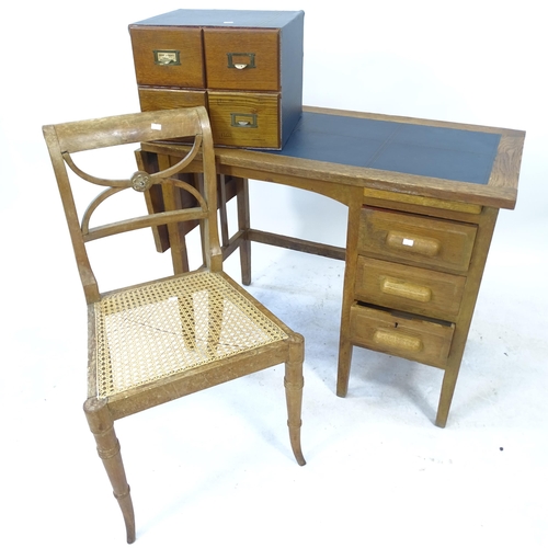 2178 - A 1930s oak desk, with blue leather skiver, single drop leaf and 3 drawers, with label for Crusader ... 