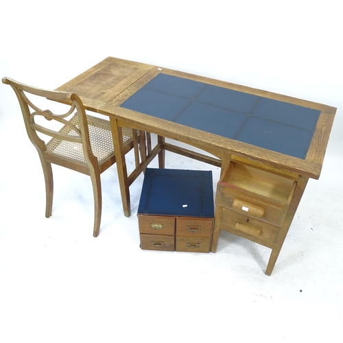 2178 - A 1930s oak desk, with blue leather skiver, single drop leaf and 3 drawers, with label for Crusader ... 