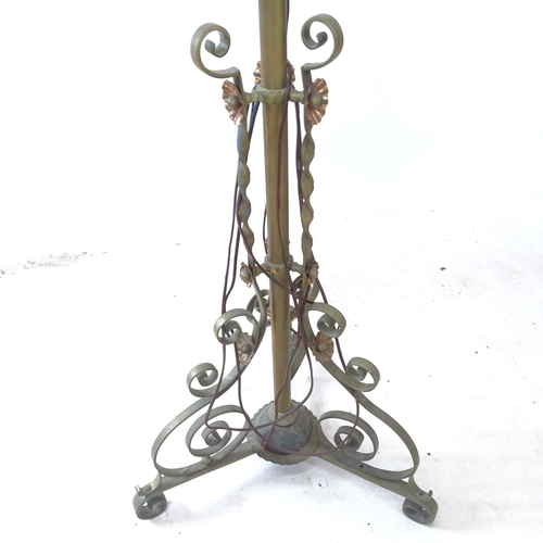 2377 - A brass telescopic standard lamp on tripod base, maximum height to bayonet fitting 155cm