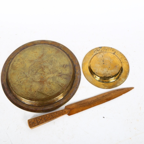 459 - 2 Middle Eastern silver and copper inlaid brass dishes, largest diameter 20cm, and a carved wood let... 