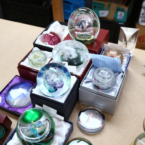 467 - A collection of paperweights, including Langham, Selkirk, and Alum Bay