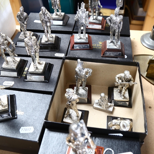 473 - A group of Royal Hampshire military figures on plinths, including Gordon Highlanders, Irish Guards, ... 