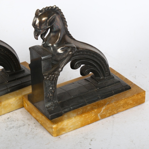 488 - A pair of Art Deco dragon bookends, on marble plinths, height 17cm