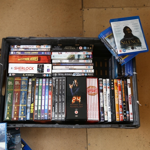 497 - A boxful of DVDs, including Lord Of The Rings, and Sherlock