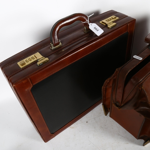 502 - Vintage leather bag, and a case with combination lock