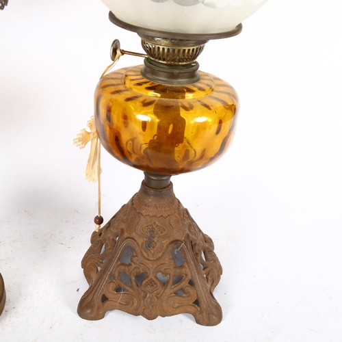 518 - An Antique cast-iron oil lamp, with amber font and etched glass shade, 50cm, and a wooden oil lamp, ... 