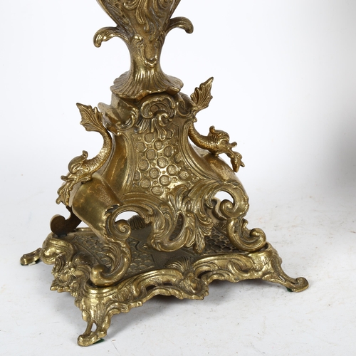 542 - A pair of ornate cast-brass candelabra, height 61cm