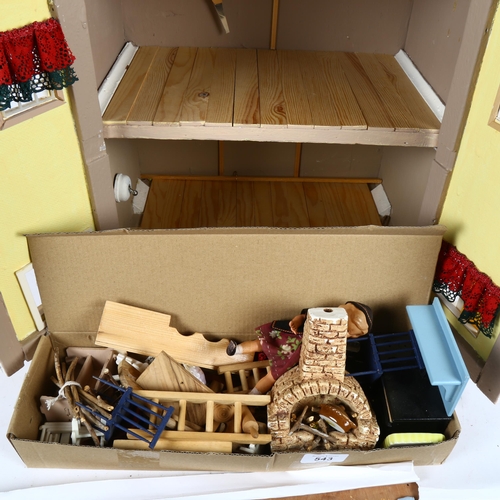 543 - A doll's house, height 56cm, with dolls, furniture and accessories