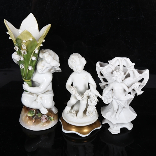 545 - A set of 4 Continental bisque porcelain cherubs, and 3 others