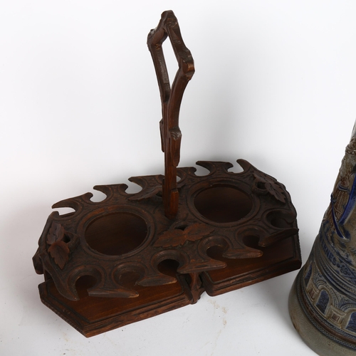 563 - A Black Forest decanter stand, a tall Rhine Ware beerstein, and an etched ruby glass vase