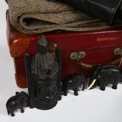 575 - A suitcase with a Harris Tweed wool jacket, a leather jacket, size XL