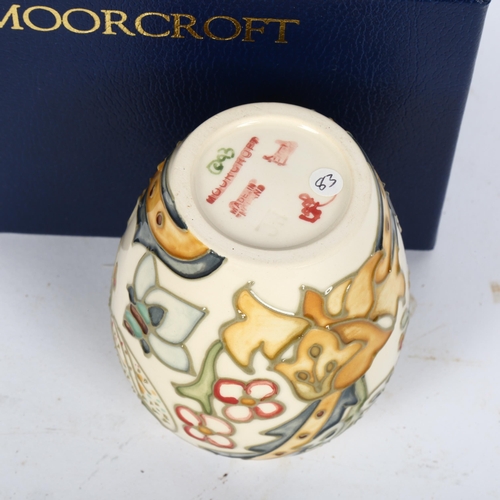 589 - MOORCROFT - a Golden Lily vase on ivory ground, 102/3, height 10cm, boxed